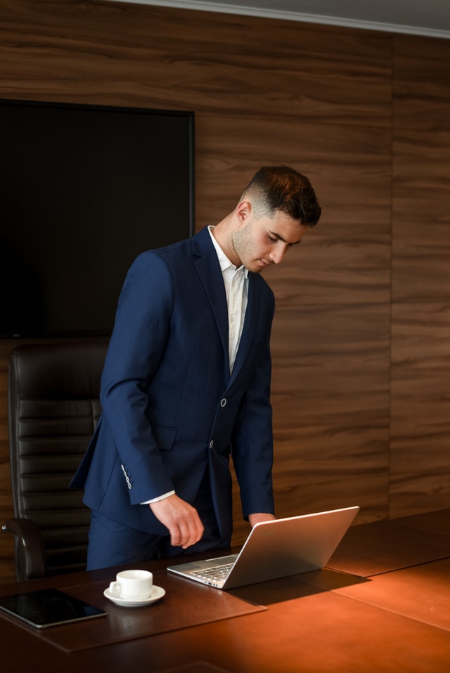 Man in business suit in a conference room