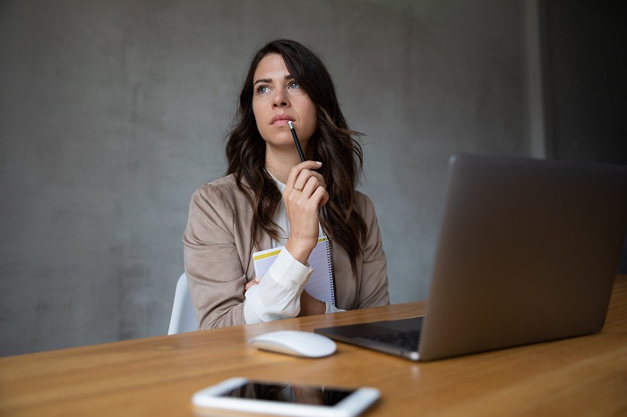 woman working hard at her office