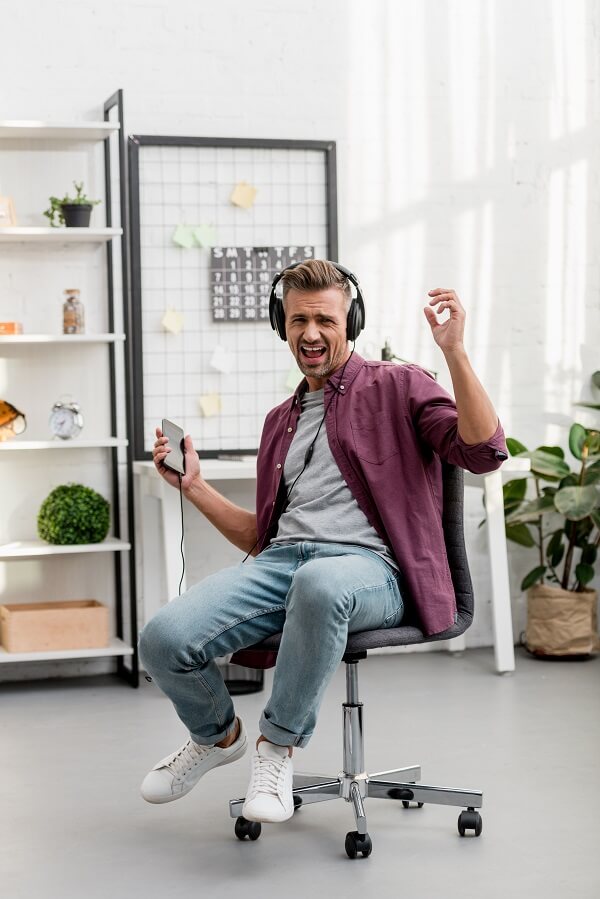 Man listening to music with cool earphones